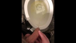 Pissing in Public Directioning Piss with his Cock