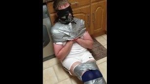 Duct Taped and Roped up Man used by Femdom 1