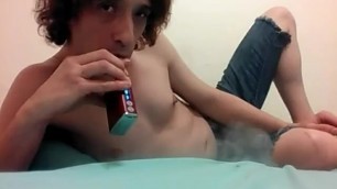 Vaping Transgirl in only Cut-Off Jeans